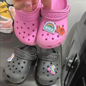 TWO PAIR CROCS Pink and Black Water Shoes with Decorative Charms